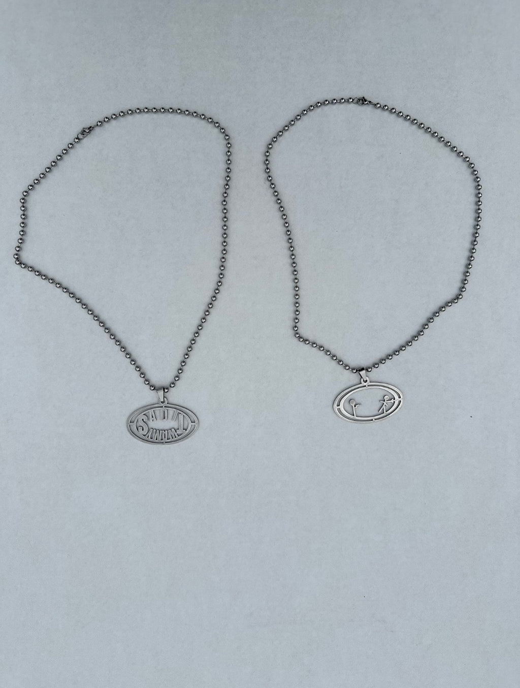 SADITWAMY NAME/FIGHT SCENE NECKLACE