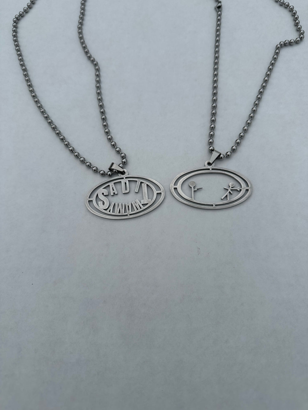 SADITWAMY NAME/FIGHT SCENE NECKLACE